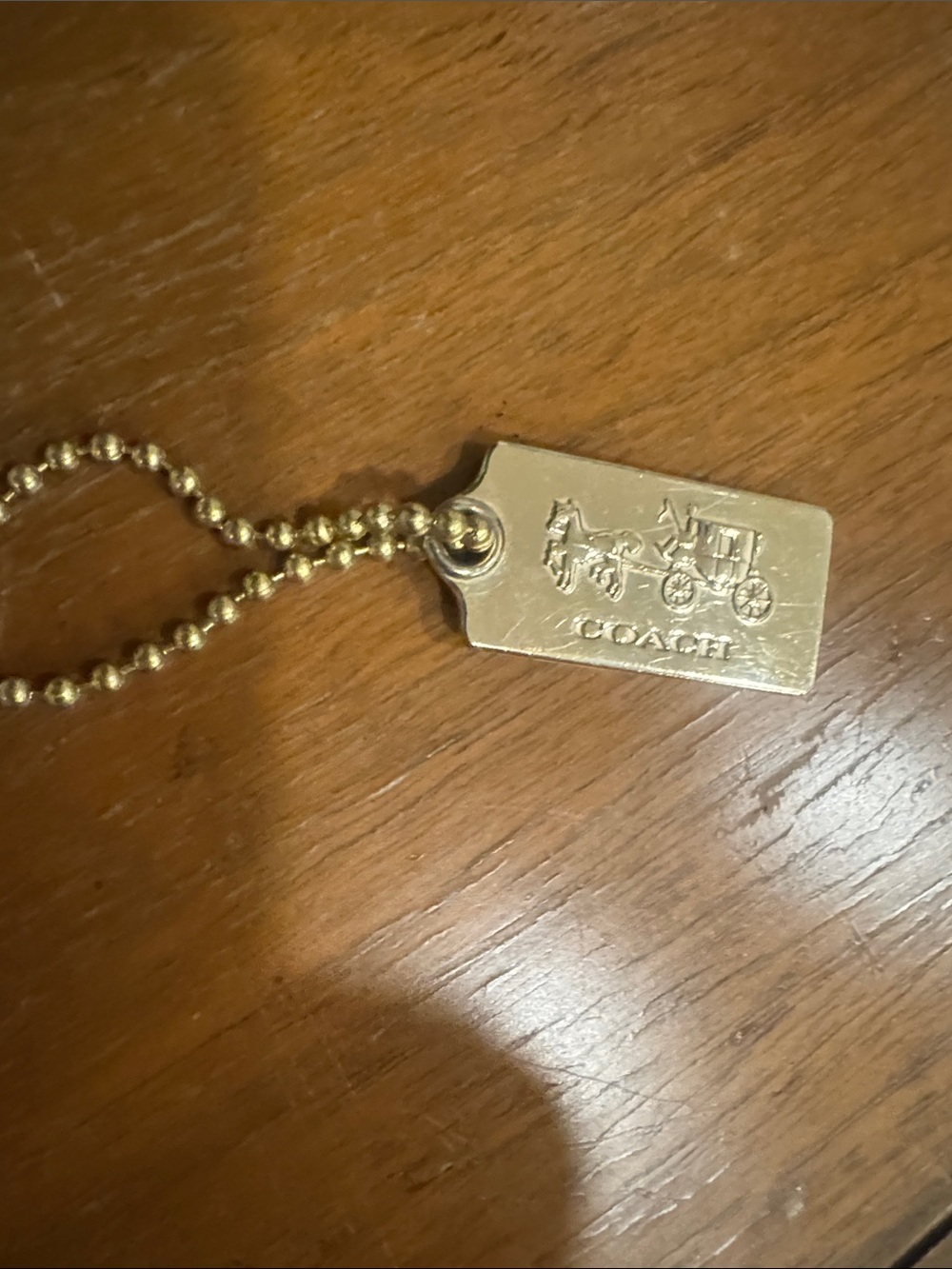 COACH Gold-tone Coach Carriage Tag Charm - Gold